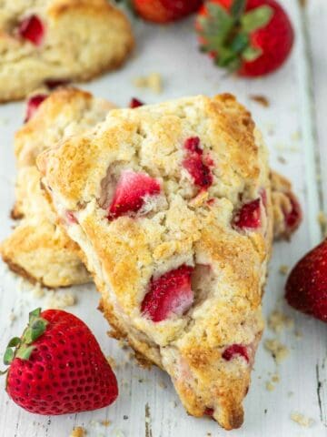 close-up of strawberry scone stacked on another